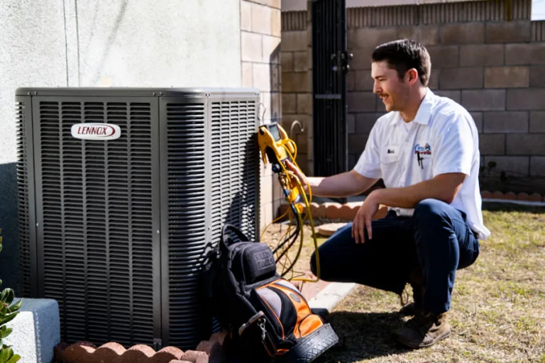 Cypress Air Conditioning technician working on outside A/C unit