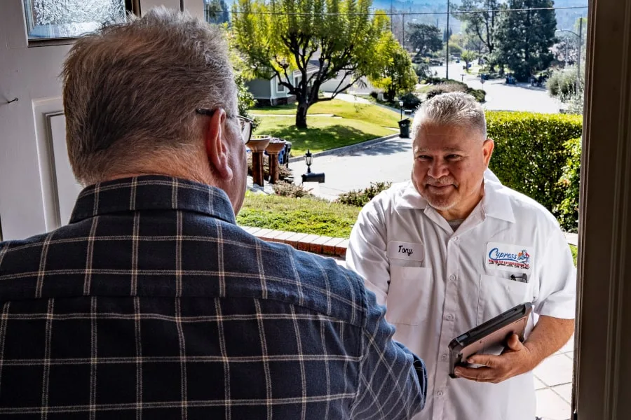 cypress air technician greets customer
